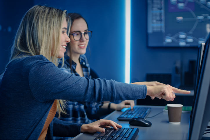 Two Female IT Programers Working